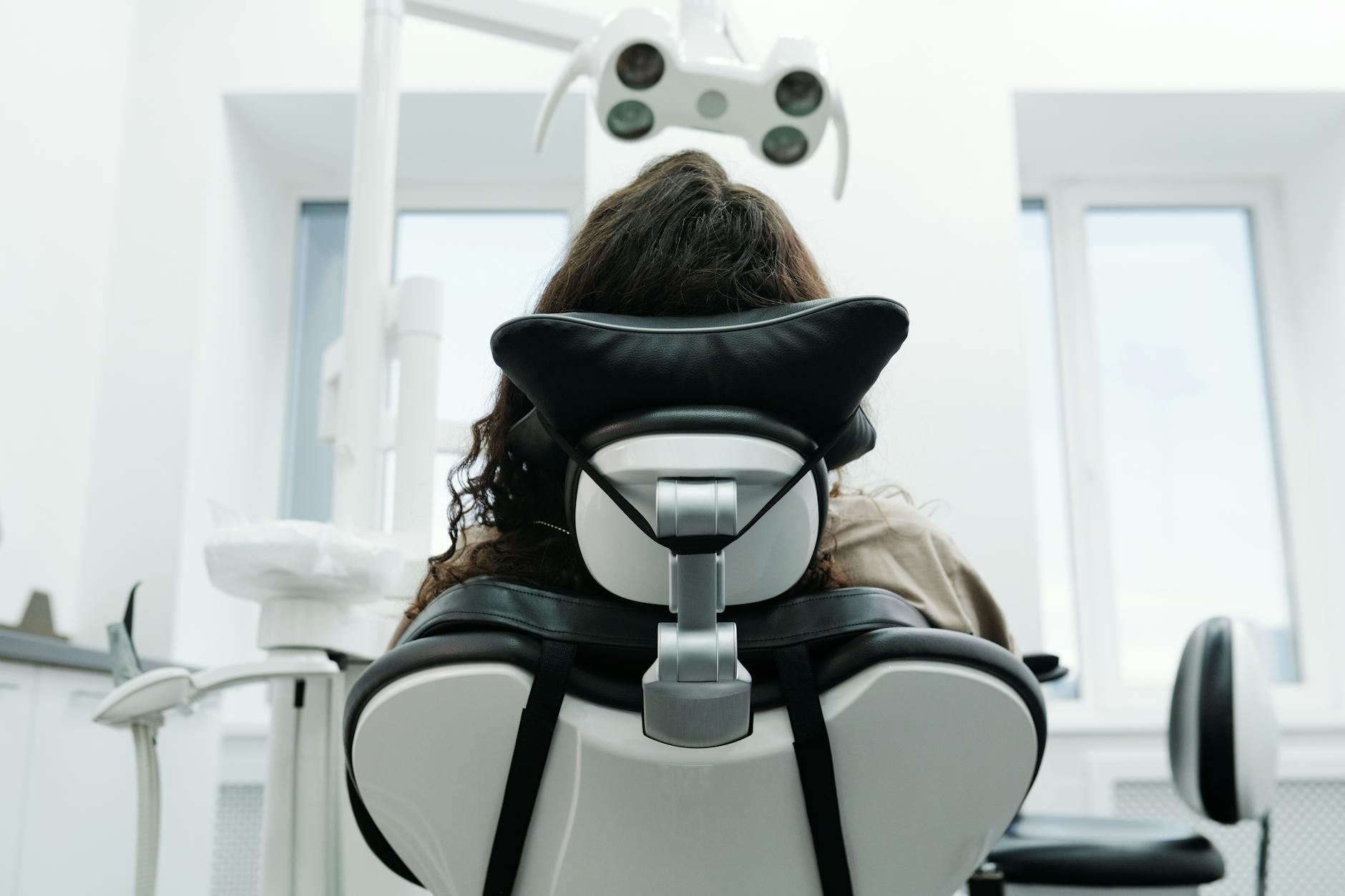 Patient experiencing comfortable premium dental care