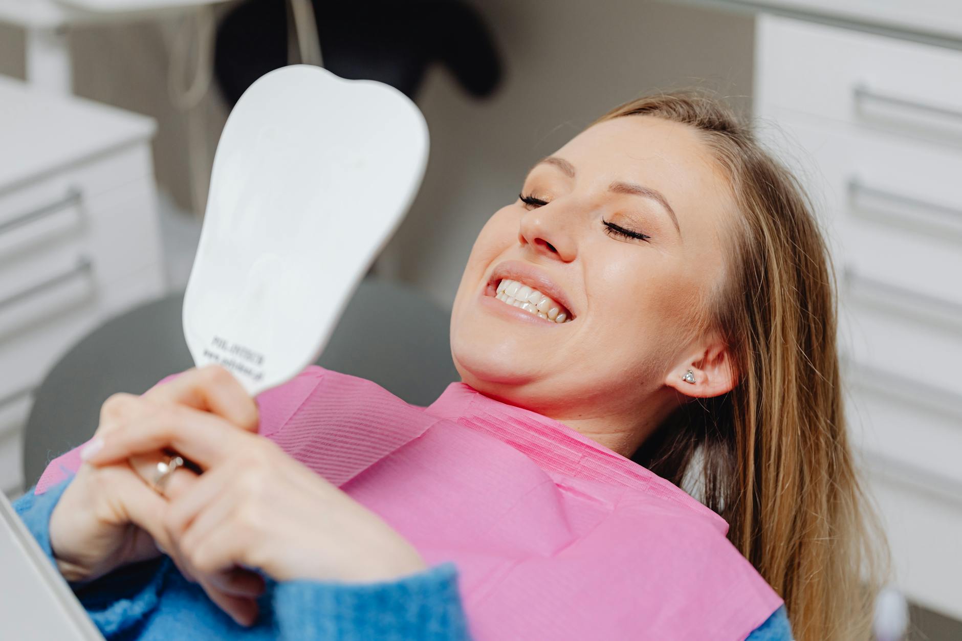 Confident smile after smile makeover financing options explained treatment at Smile Dental Center