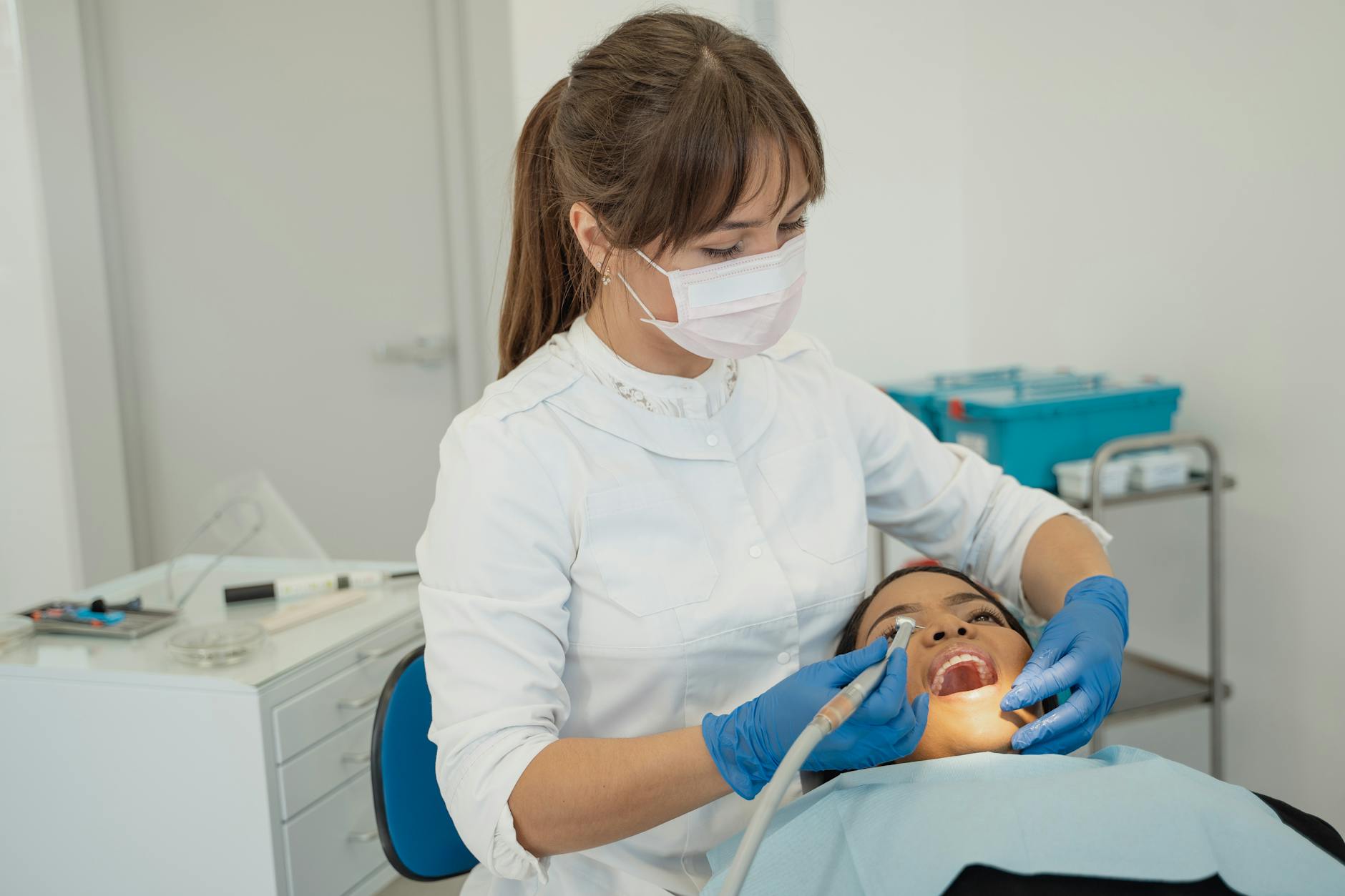 Professional dental cleaning to maintain veneer longevity