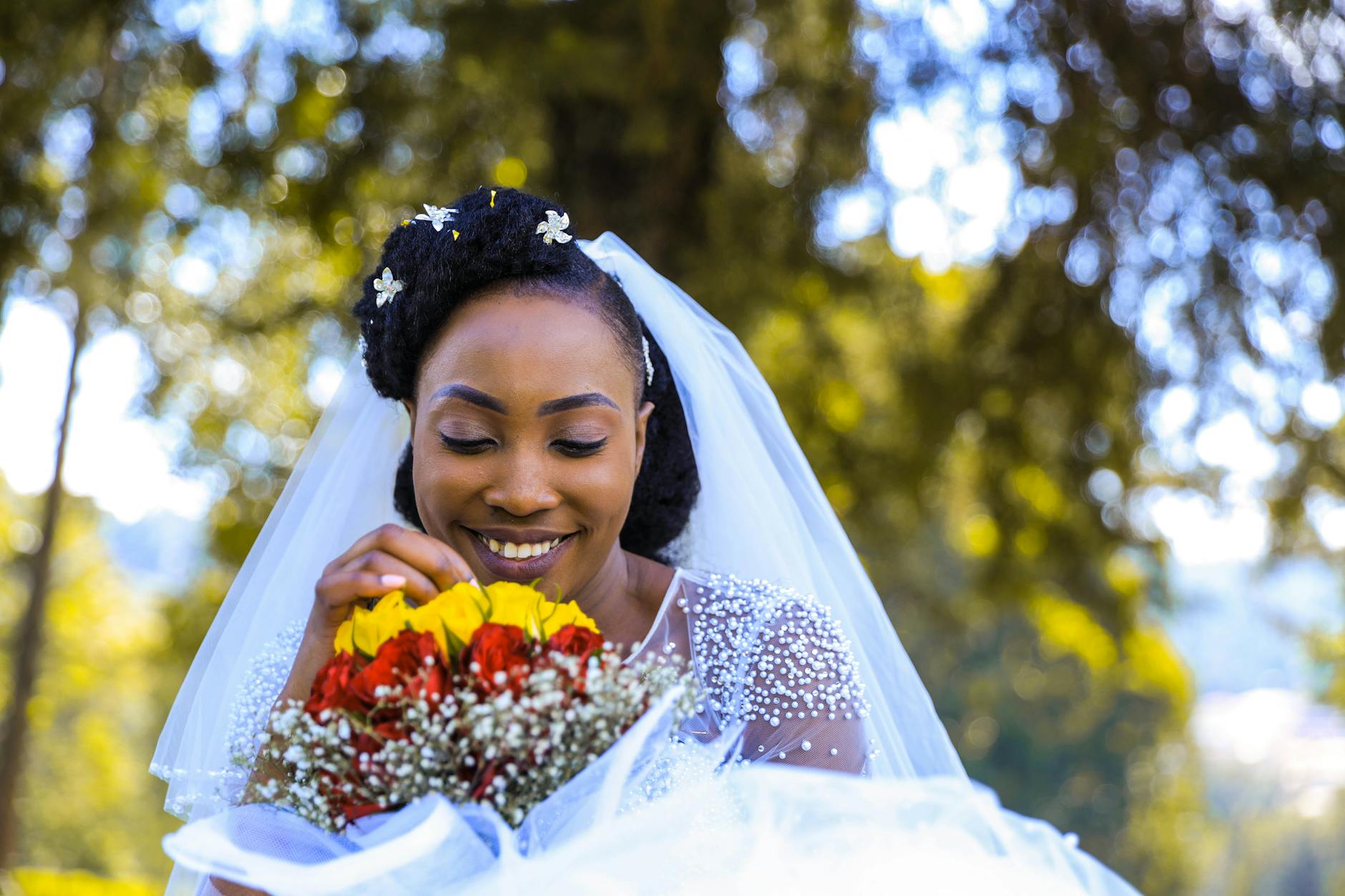 Bride showing beautiful wedding-ready smile after cosmetic dentistry